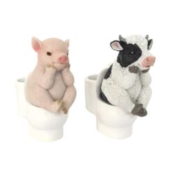 Pig or Cow Sitting on Toilet